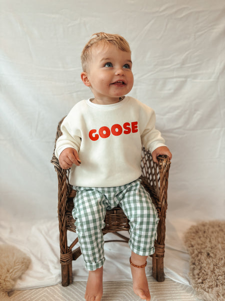 baby boy wearing sage green gingham trousers - Sadie:Baby UK